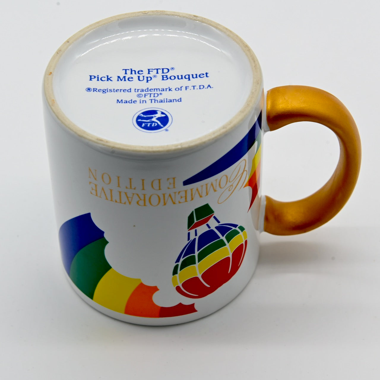 Remember the rainbow mugs from the 80s? FTD 10th Anniversary Collector Edition Pick Me Up Bouquet Mug Features Iconic Rainbow Hot Air Balloon Mug 1984 Teleflora Flowers Send Coffee Cup Tea Collector Collection Decor Advertising Promo Floral Container Forget Me Not Drinks Drinking Mugs Cups Ceramic Vintage Retro Fun