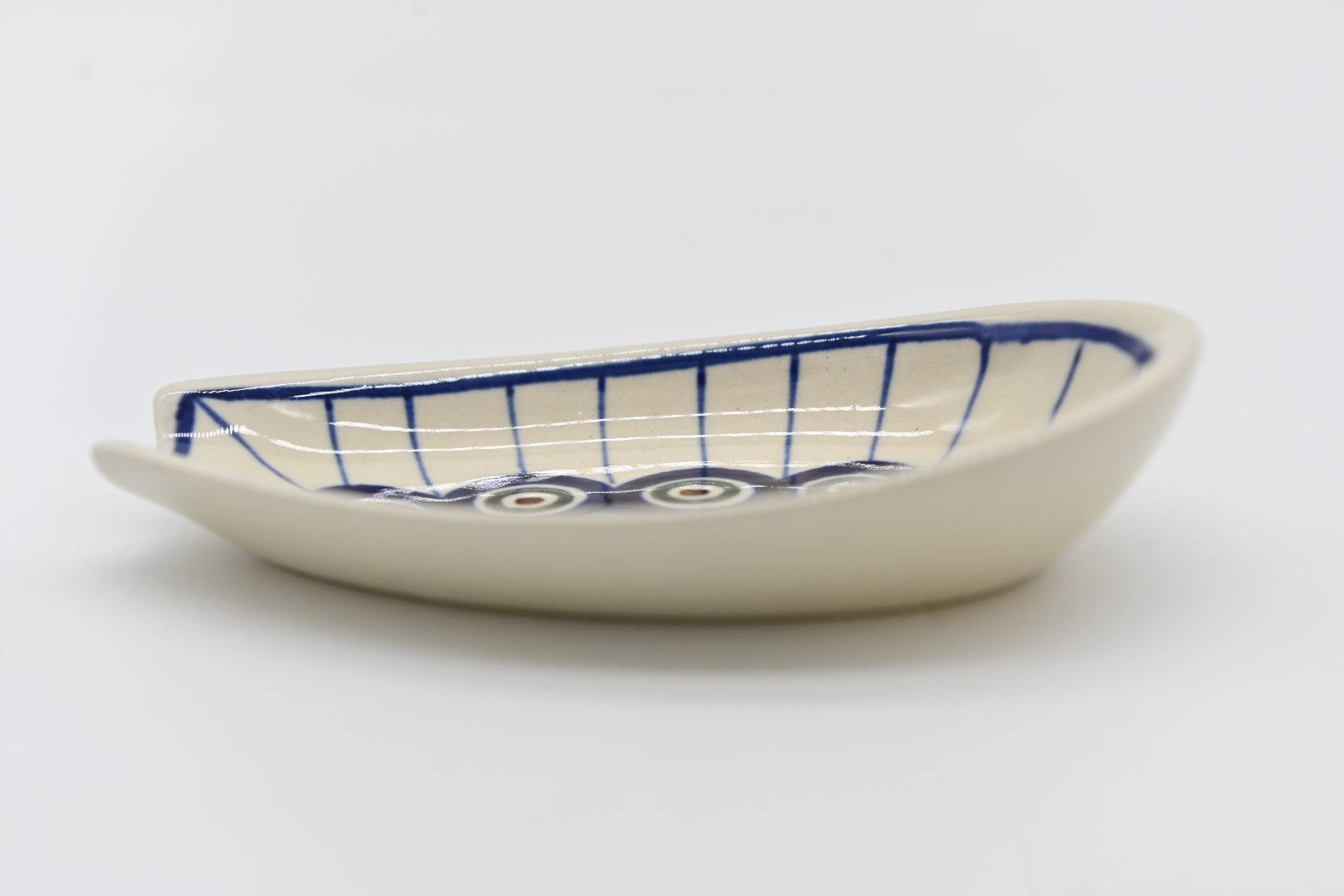 Don't get your counter nasty. Polish Pottery Spoon Rest Off White Base Color Blue, Green, Burgandy Peacock Eyes Modern Patterned Circles Mid Mod Collectible Kitchen Decor Retro Ceramic Collector Gift
