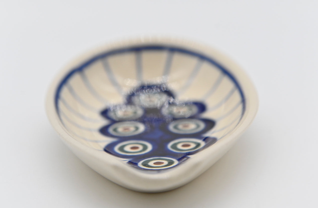 Don't get your counter nasty. Polish Pottery Spoon Rest Off White Base Color Blue, Green, Burgandy Peacock Eyes Modern Patterned Circles Mid Mod Collectible Kitchen Decor Retro Ceramic Collector Gift