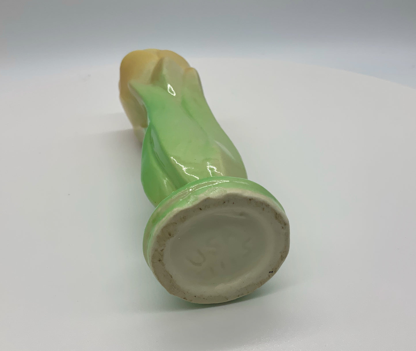 Vintage Shawnee Pottery Figural Vibrant Yellow Tulip With Green Leaves Approximately 4.75" Tall x 1.5" Diameter "USA 1115" Marked on Bottom No Chips, Cracks, Crazing Typical mold marks from rough edges under the glaze. mid mod and beyond dot com for people who like cool stuff