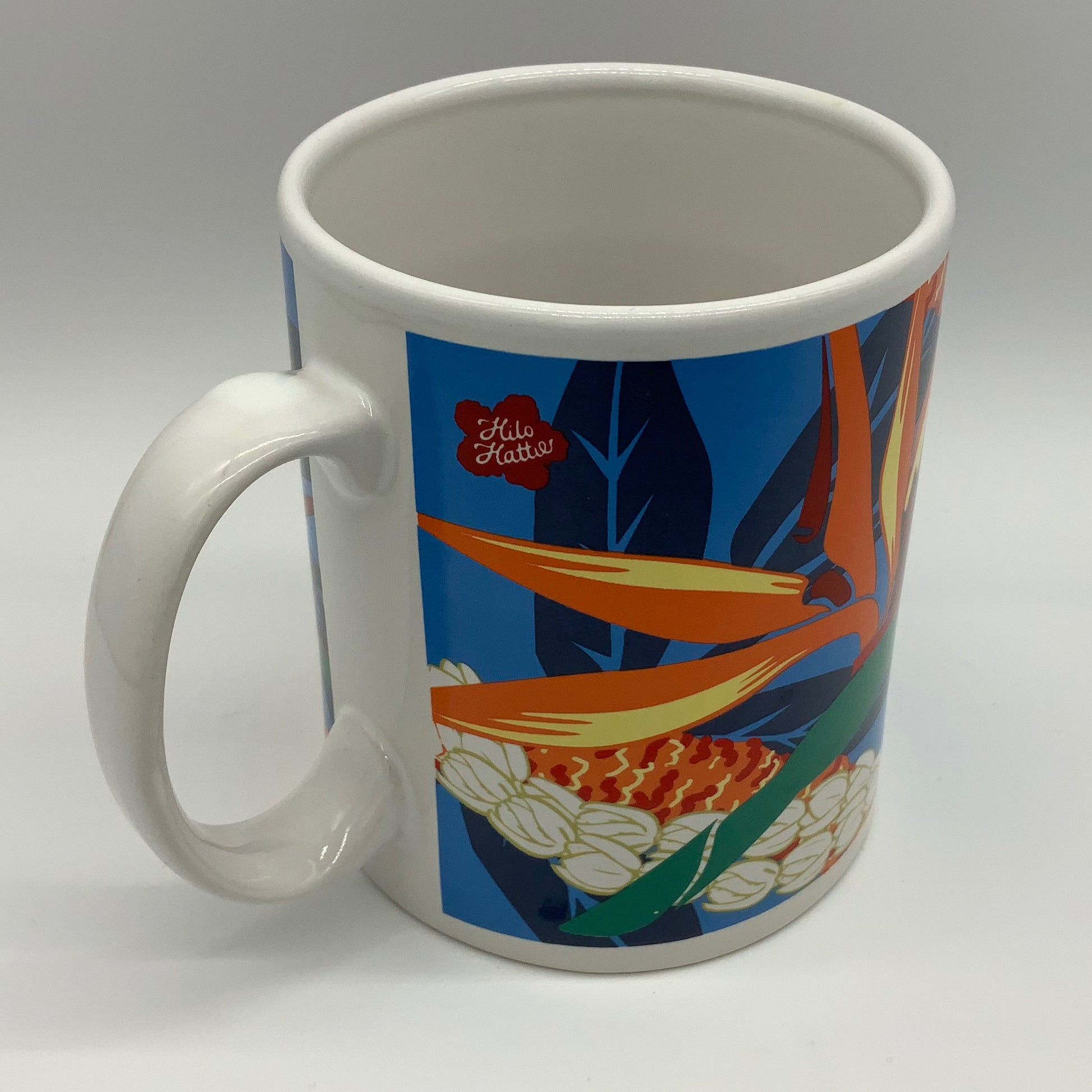 Rad Retro 1999 Hawaii Hilo Hattie Coffee Mug Vibrant Bird of Paradise Floral Design Store of Hawaii 1999 Island Heritage Vibrant Orange Blue Green Tea Starbucks Collector Hang Loose Flowers Surf Surfer Travel PreCovid Souvenir Collectible Vintage reuse repurpose be uniquely you mmb midmodandbeyond #shopsmall