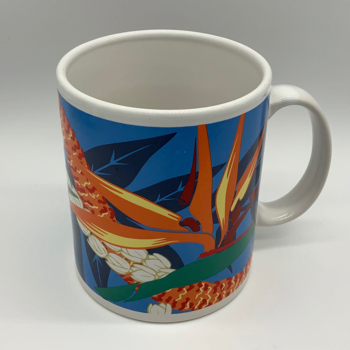 Rad Retro 1999 Hawaii Hilo Hattie Coffee Mug Vibrant Bird of Paradise Floral Design Store of Hawaii 1999 Island Heritage Vibrant Orange Blue Green Tea Starbucks Collector Hang Loose Flowers Surf Surfer Travel PreCovid Souvenir Collectible Vintage reuse repurpose be uniquely you mmb midmodandbeyond #shopsmall