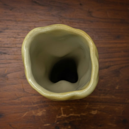 Birdseye view of Shawnee Pottery  Vase Yellow Tulip With Green Leaves 